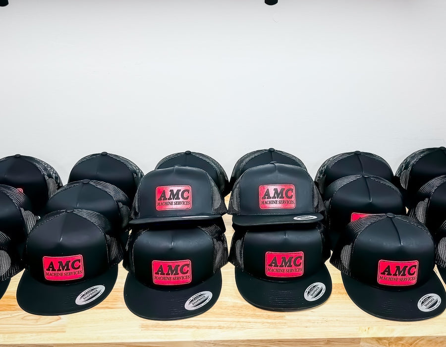 Completed custom AMC Machine Services patch hats