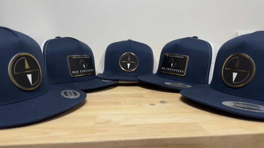 Group of MJE Executive Transportation custom patch hats