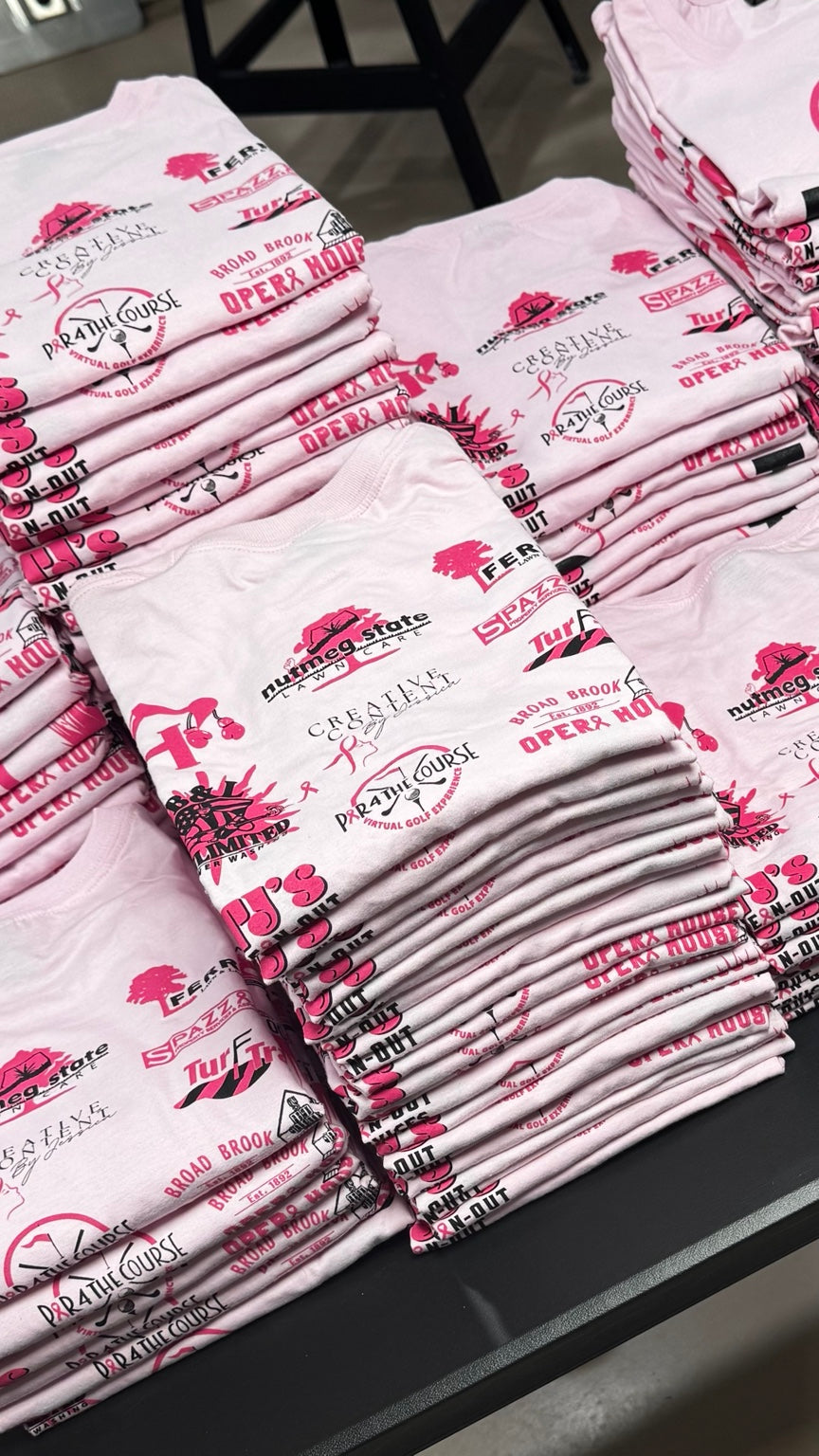 Large finished pink multi-logo screen printed apparel run