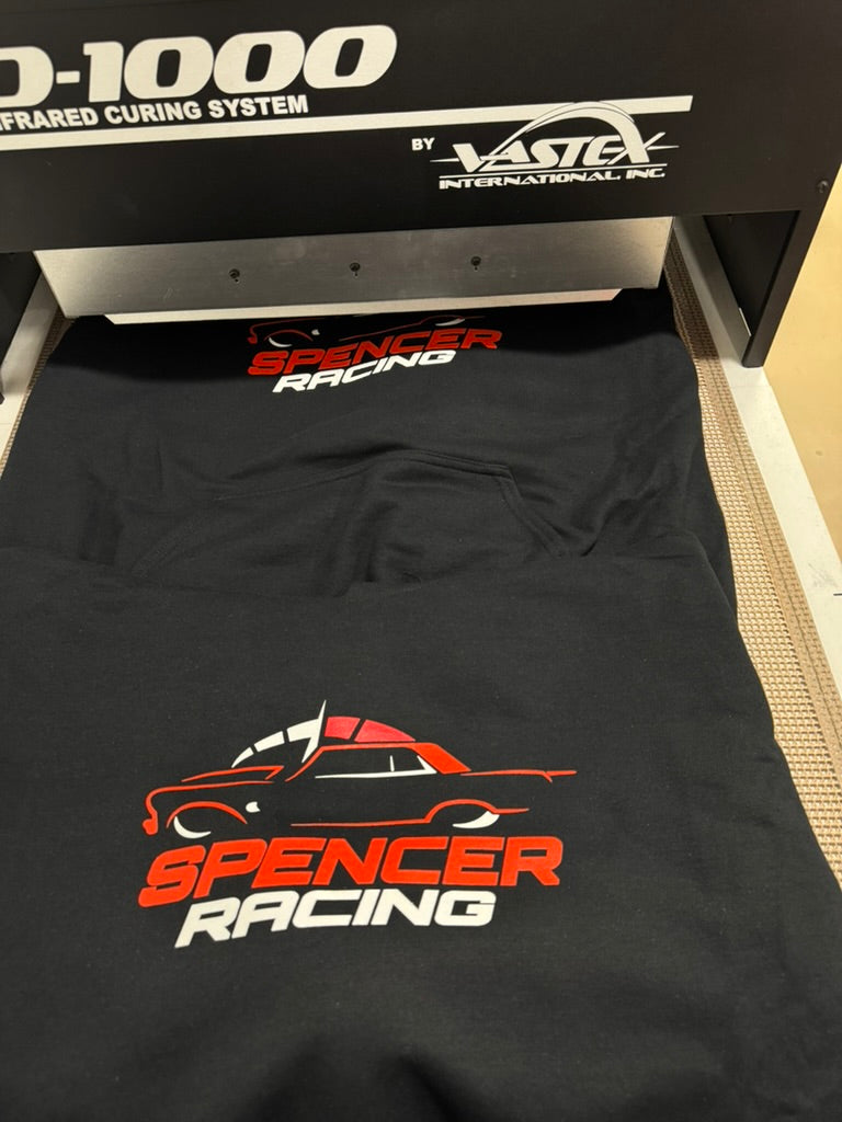 Spencer Racing multicolor screen print curing on conveyor dryer